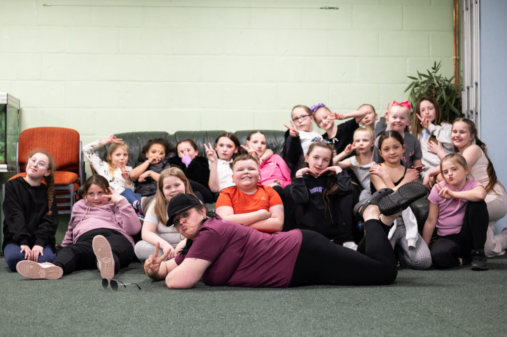 Image shows young people from a Future Communities Fund partner