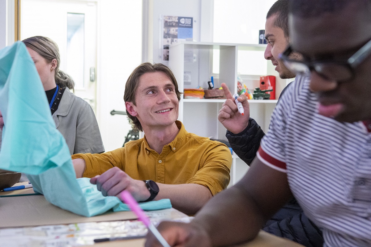 GMYN support worker smiling at young person